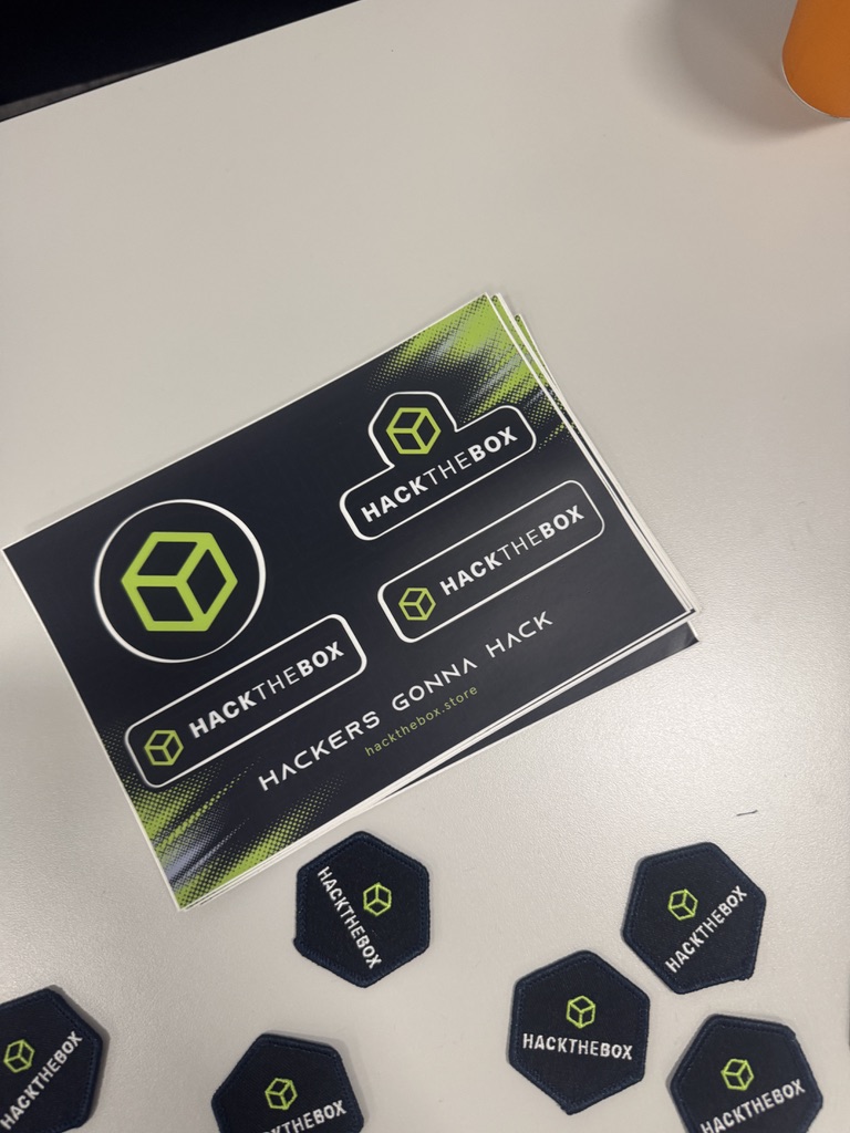 HackTheBox stickers and patches collected at Cyber Showdown